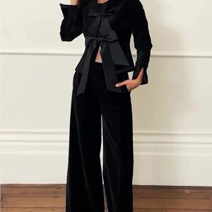 Black velvet two piece pantsuit with satin bow and accent